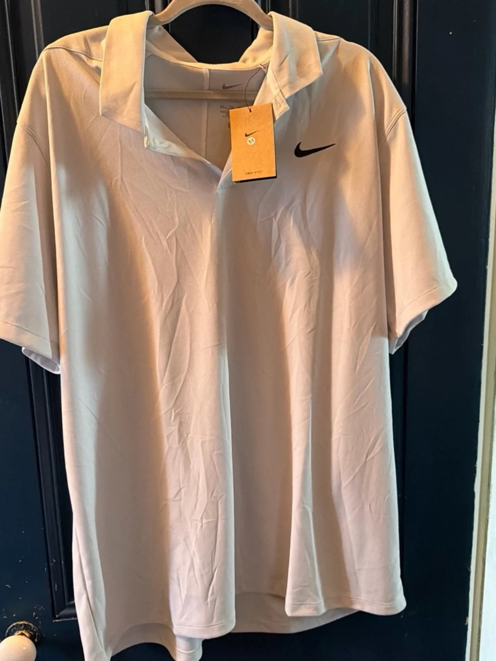Nike Men’s Light gray Polo with Black Swoosh